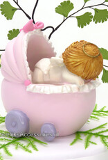 Slappende baby meisje in roze wieg spaarpot