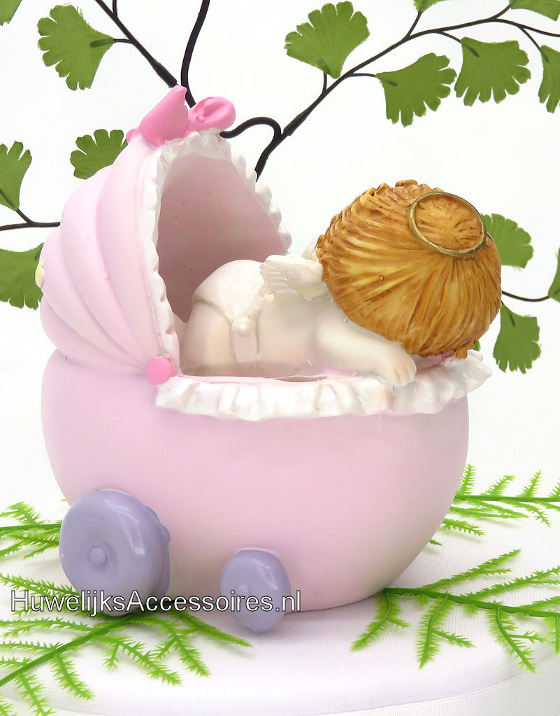 Slappende baby meisje in roze wieg spaarpot