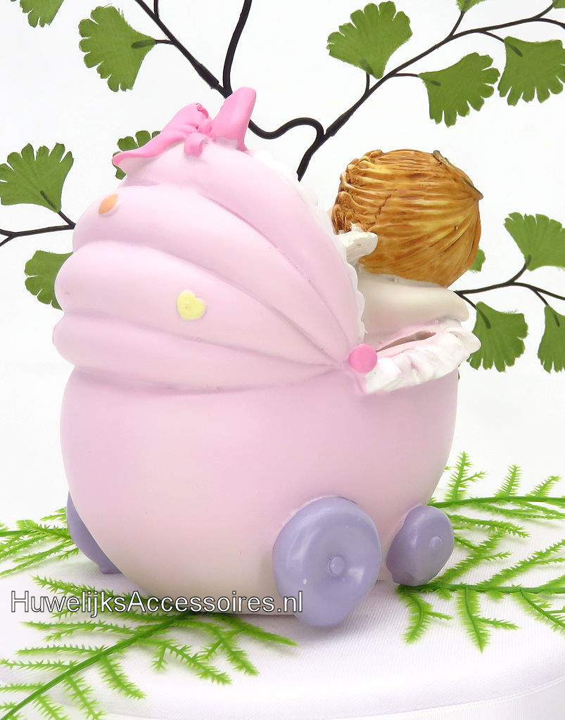 Slappende baby meisje in roze wieg spaarpot