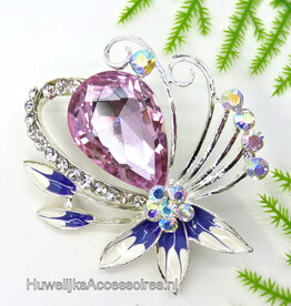 Broche met een grote lila strass steen
