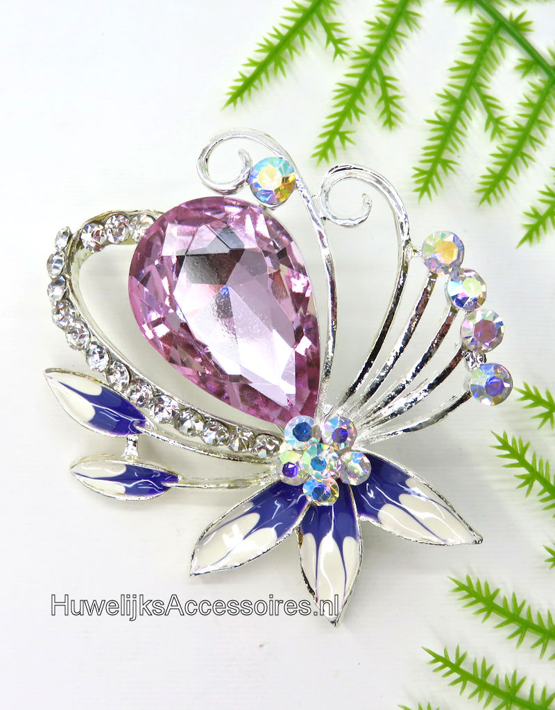 Hele mooie broche versierd met paars en wit geëmailleerd  bloemen