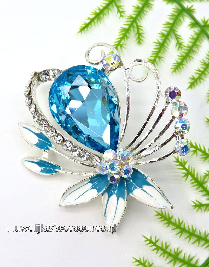 Prachtige broche versierd met turkoois en wit geëmailleerd  bloemen