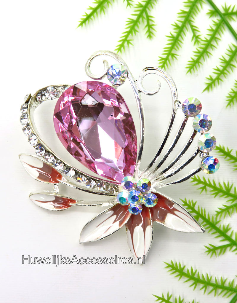 Hele mooie broche versierd met roze en wit geëmailleerd  bloemen