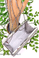 Zeer luxe zilverkleurig clutch box met strass steentjes