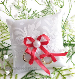 Honden ringkussen met rode lint