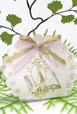 Communie bedankje versierd met lint en een bijbel