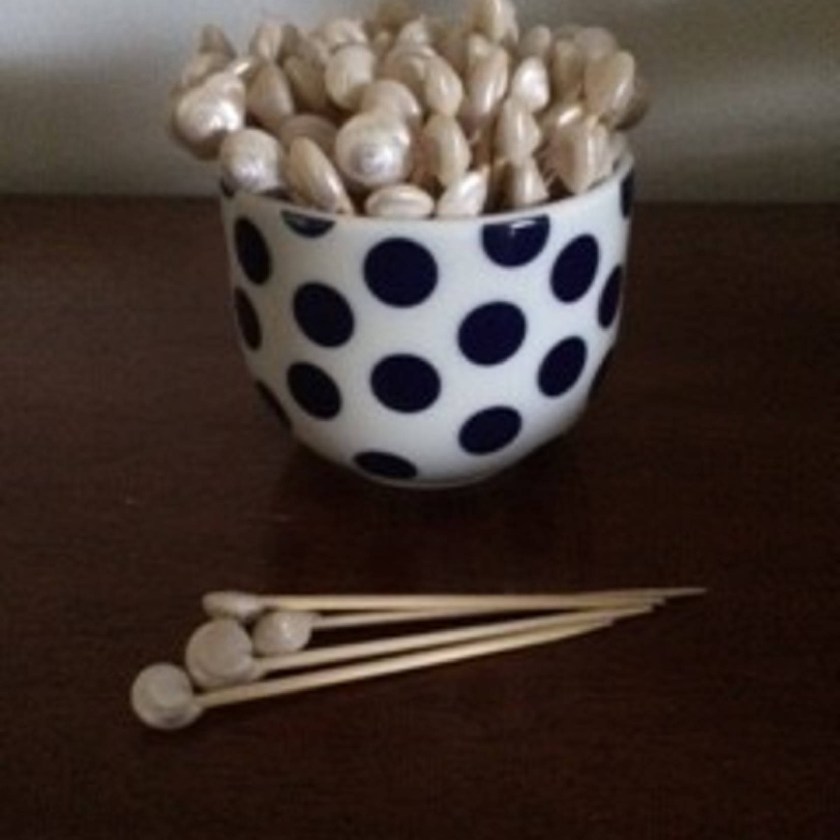 Cocktail sticks with a shell