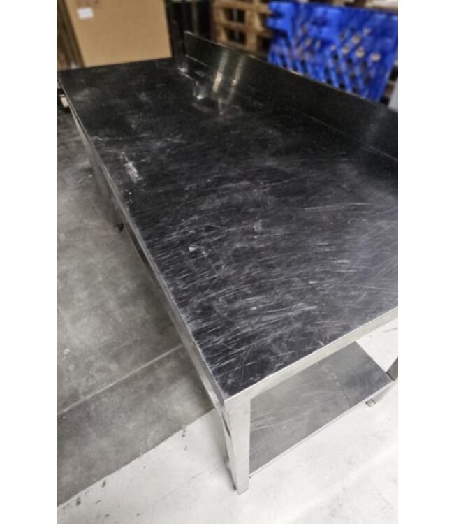 Occasion: RVS Werktafel met bodemschap en achteropstand | 170cm breed | 70cm diep