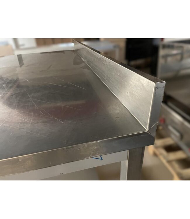 Occasion: RVS Werktafel met onderplank en spatrand | (B)150x(D)70x(H)90cm