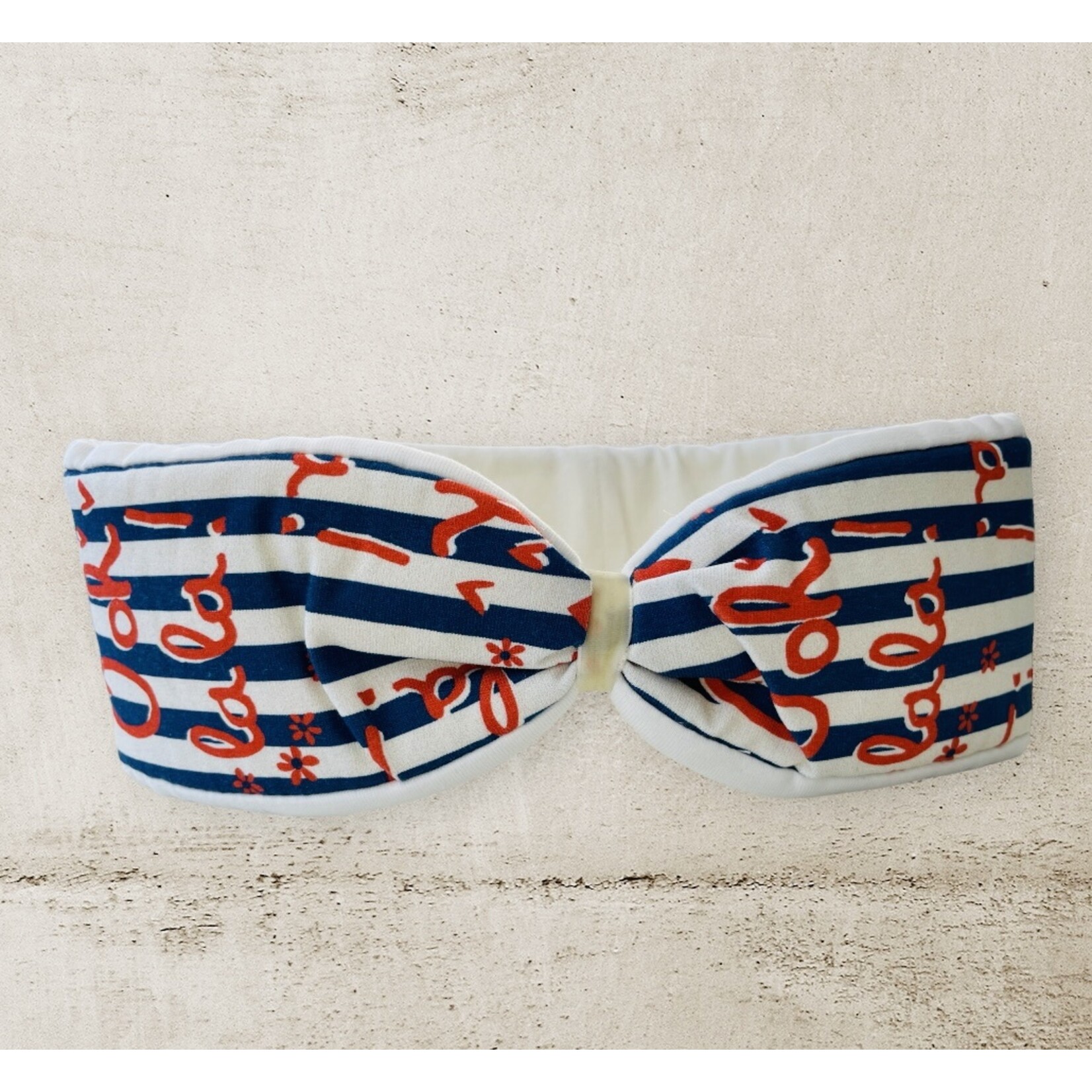 Headband "ooh la la" in a bow optic with a white velvet ribbon