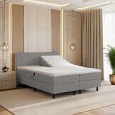 RETOURDEAL Elektrische boxspring 180 x 200 - Stof Grijs | Hoofdbord Glad  (Niet in originele verpakking + Stofschade aanwezig)
