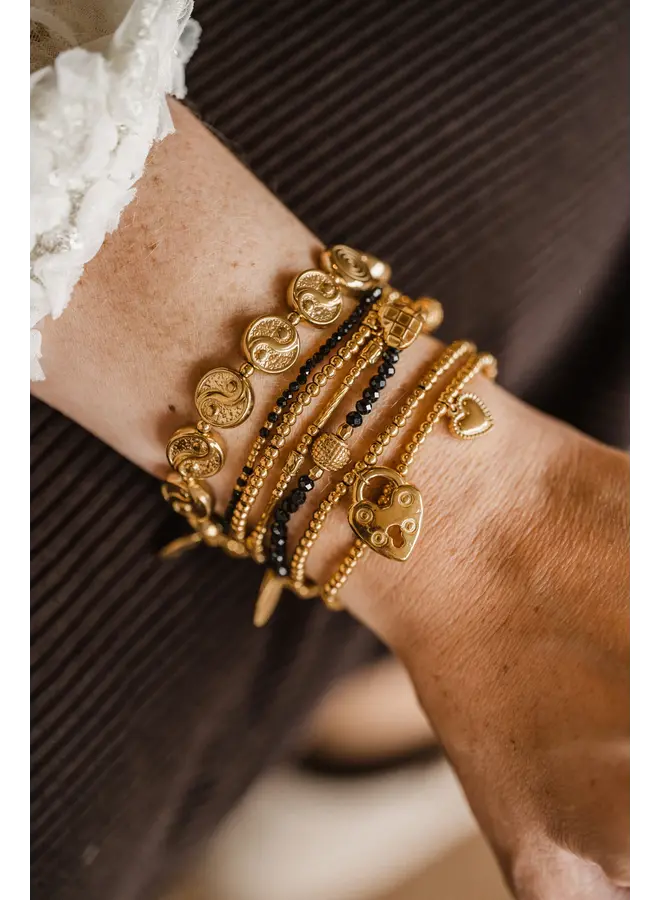 By shir gouden elastische armband met een hart slotje-goud