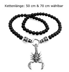 Skorpion mit Perlenkette