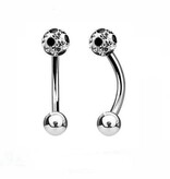 Christinapiercing mit einer 5mm Glitzerkueln