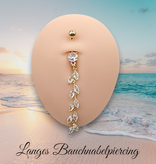 Langes Bauchnabelpiercing  mit funkelndem Kristall