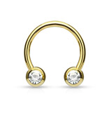 1,2 mm Hufeisenring Gold PVD mit Kristallkugeln