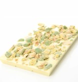 A bar of white chocolate with wasabi peanuts