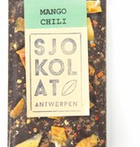 A bar of dark chocolate with mango and chili pepper