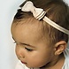 Your Little Miss Baby haarbandje met dubbele strik - Champagne colored Your Little Miss Baby haarbandje met dubbele strik - Champagne colored