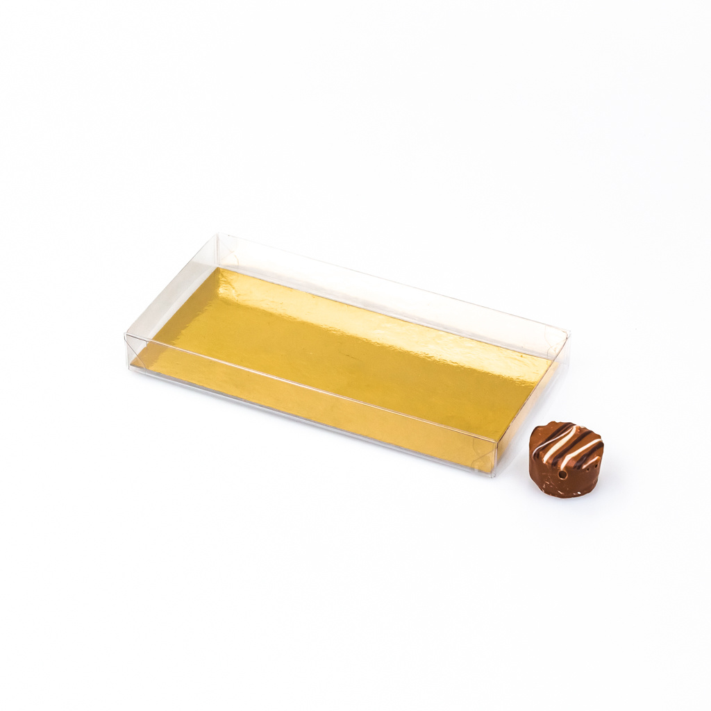 Boîte à comprimés transparente avec carton argent/or