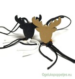 Lucky reindeer in gold and black