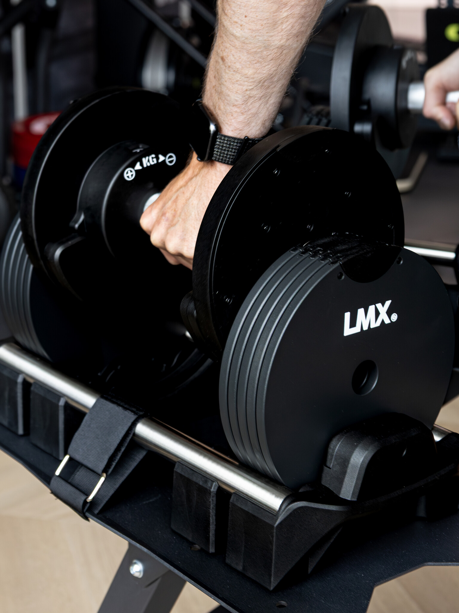 LMX. verstelbare dumbbells in opbergrek