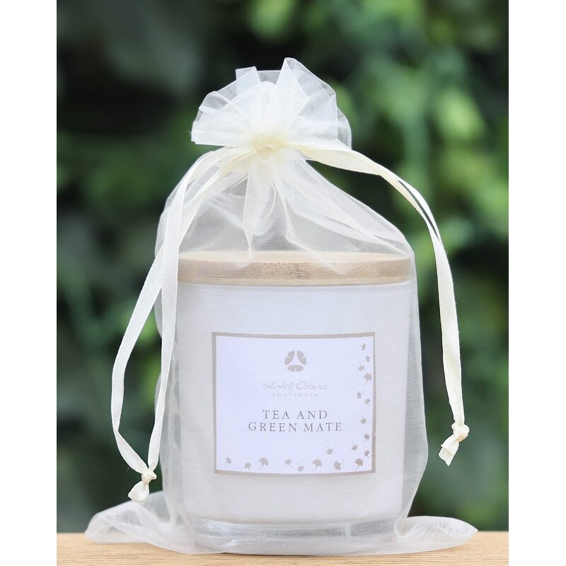 Gepersonaliseerde geurkaars in organzazakje