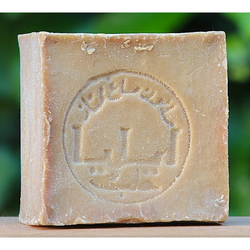 Blik met alepzeep en spons