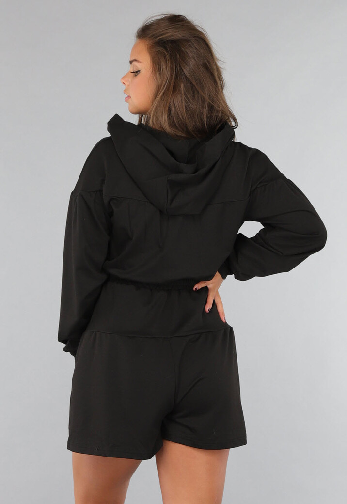 Zwarte Stretch Playsuit met Capuchon