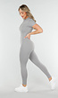 Getailleerde Grijze Stretch Sport Jumpsuit met Korte Mouwen en Ritssluiting