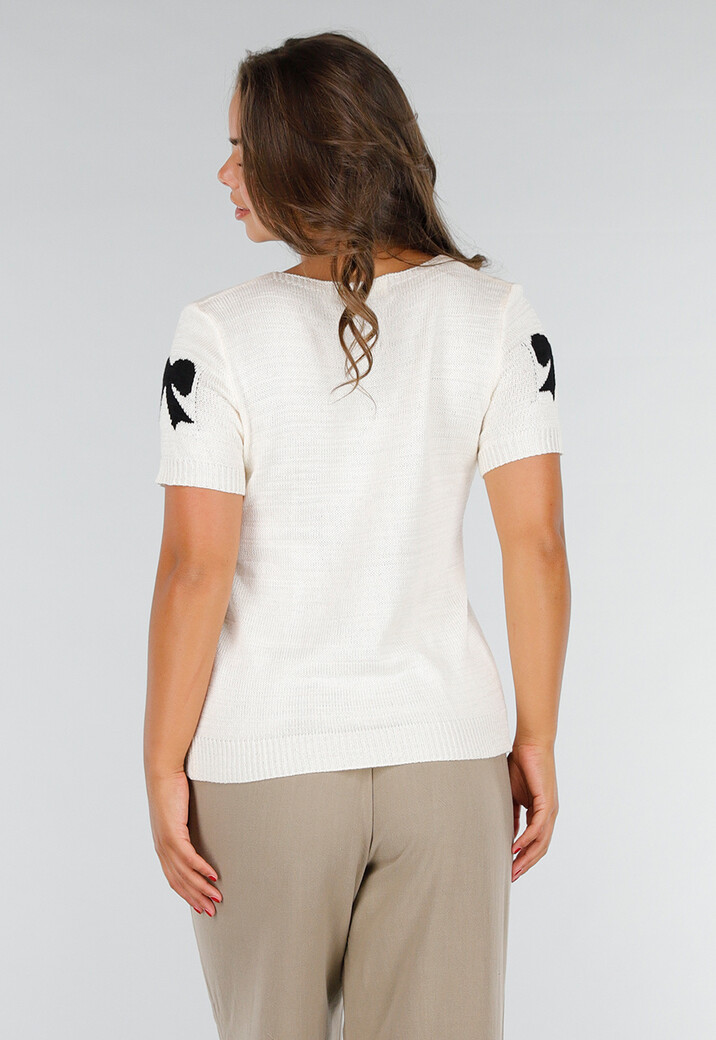 Crème Gebreide Top met Zwarte Strikjesprint, Stretch en Boorden aan Mouw en Onderzijde