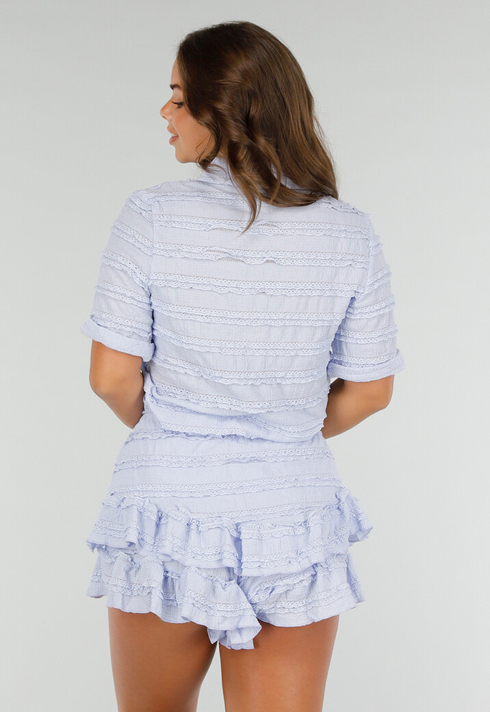 Babyblauw Stretchsetje met Skort en Ruches