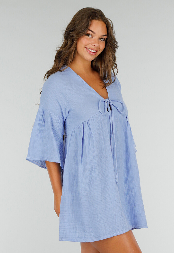 Lichtblauwe Jurk met Diepe V-hals en Losse Pasvorm