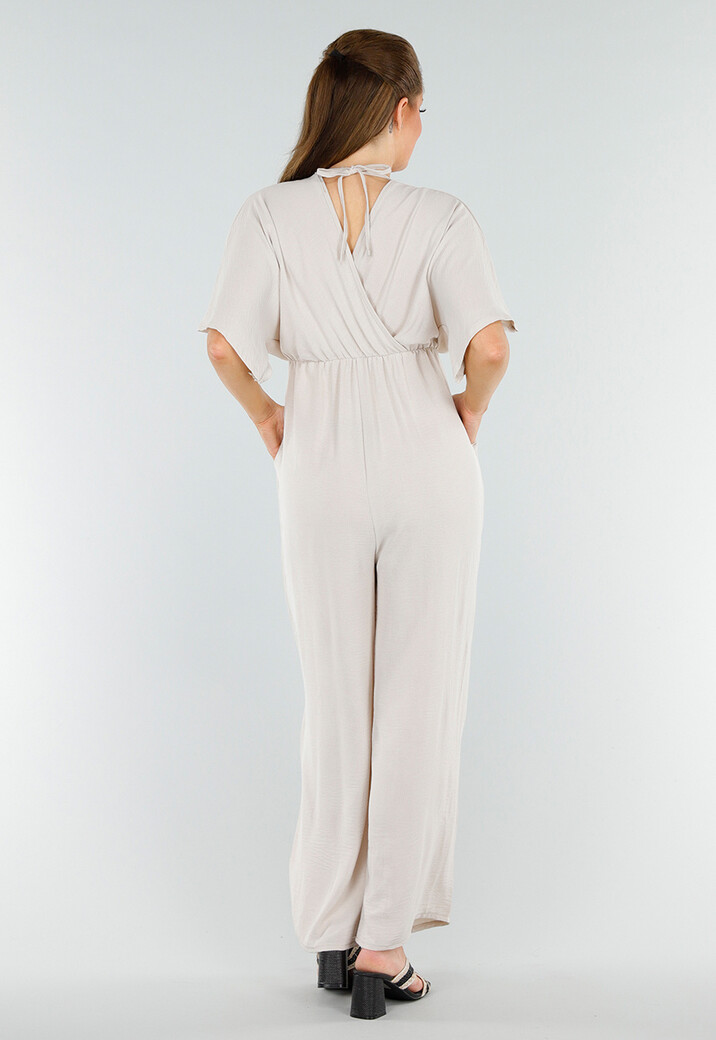 Beige Linnenlook Jumpsuit met Wijde Pijpen en Lage V-Hals