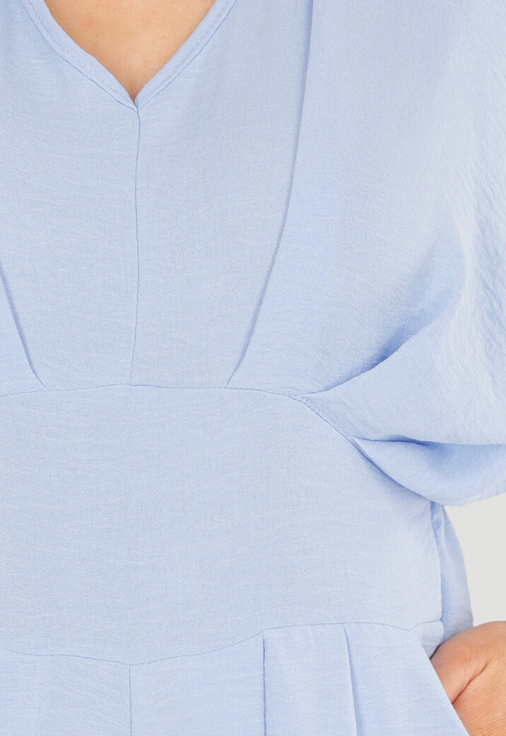 Lichtblauwe Jumpsuit met Wijde Pijpen en Lage V-Hals in Linnenlook