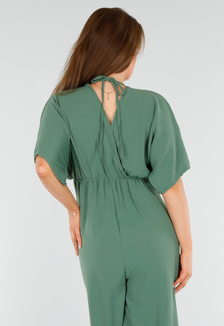 Groene Wijde Jumpsuit met V-Hals en Striksluiting op de Rug