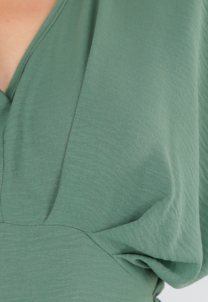 Groene Wijde Jumpsuit met V-Hals en Striksluiting op de Rug