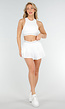 Witte Sportset met Plissé Skort en Crop Top met Gestreepte Band