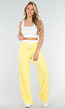 Witte Crop Top en Butter Yellow Wijde Broek Set met Elastische Taille