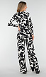 Zwart-Witte Stretch Jumpsuit met Print en Overslagtop