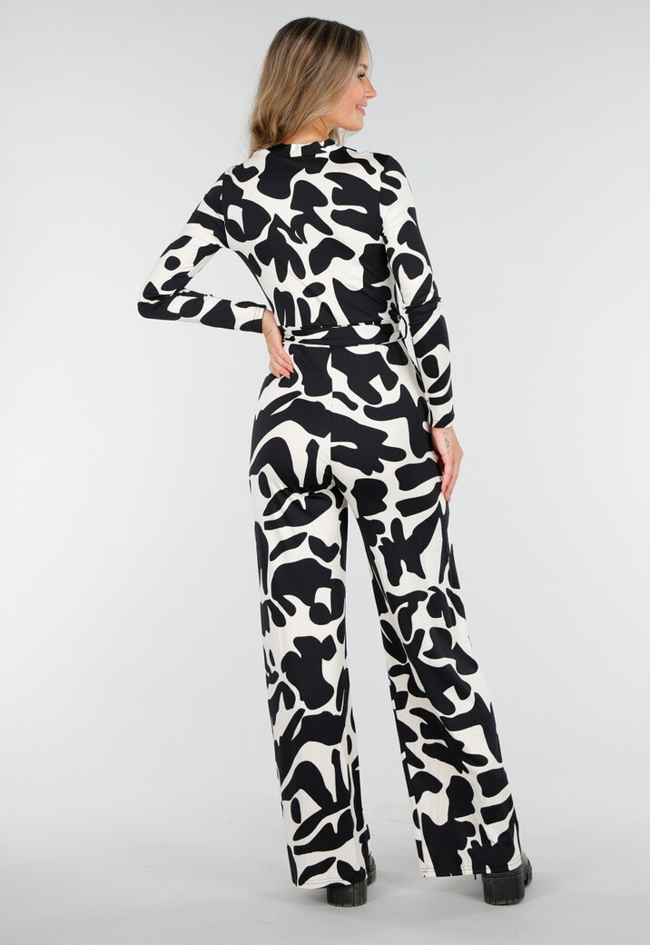 Zwart-Witte Stretch Jumpsuit met Print en Overslagtop