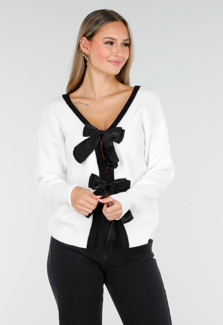 Witte Cardigan met Zwarte Strikken en Lange Mouwen