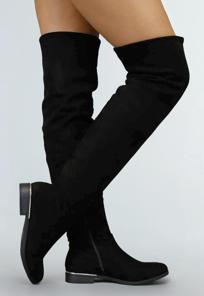 Zó draag je de grootste laarzentrend van dit najaar: over-the-knee boots