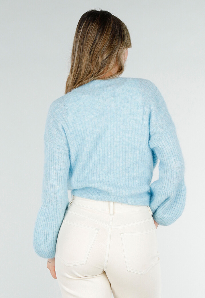 Lichtblauwe Wikkel Trui met Strikdetail