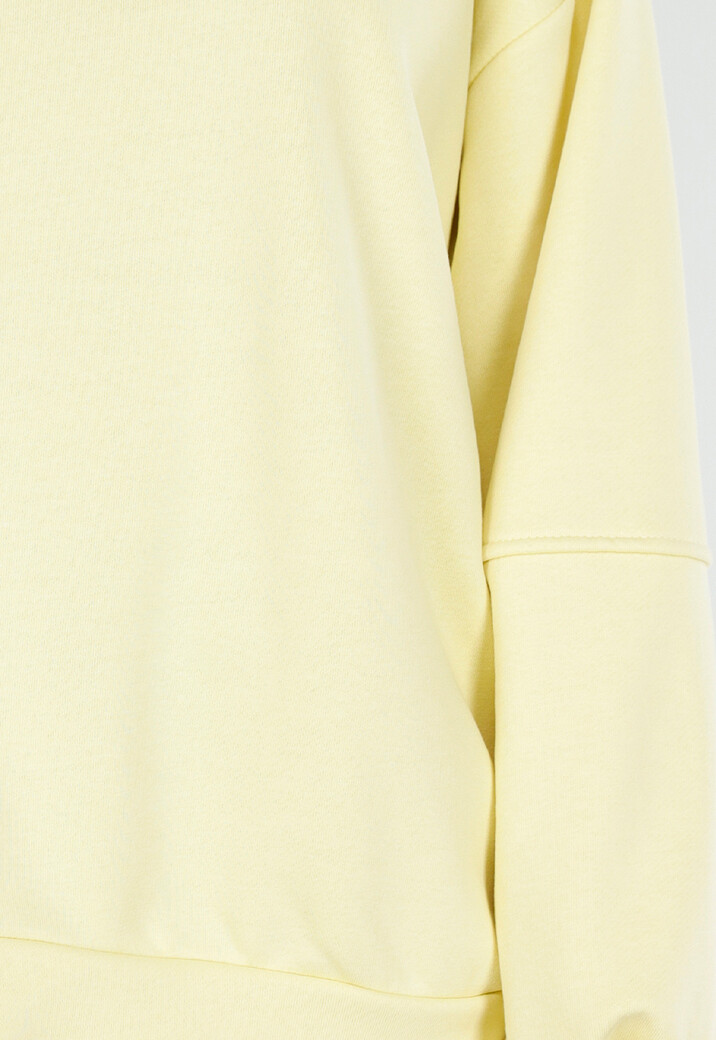 Gele Sweater met Good Vibes Print op Rug