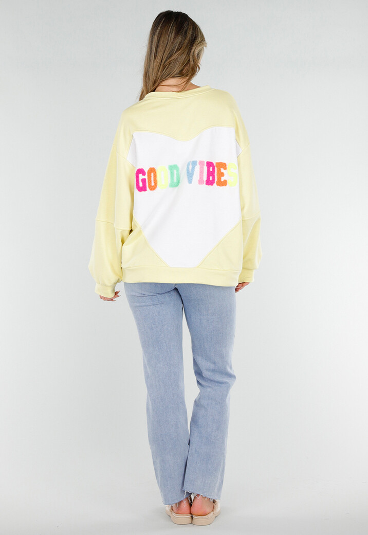 Gele Sweater met Good Vibes Print op Rug