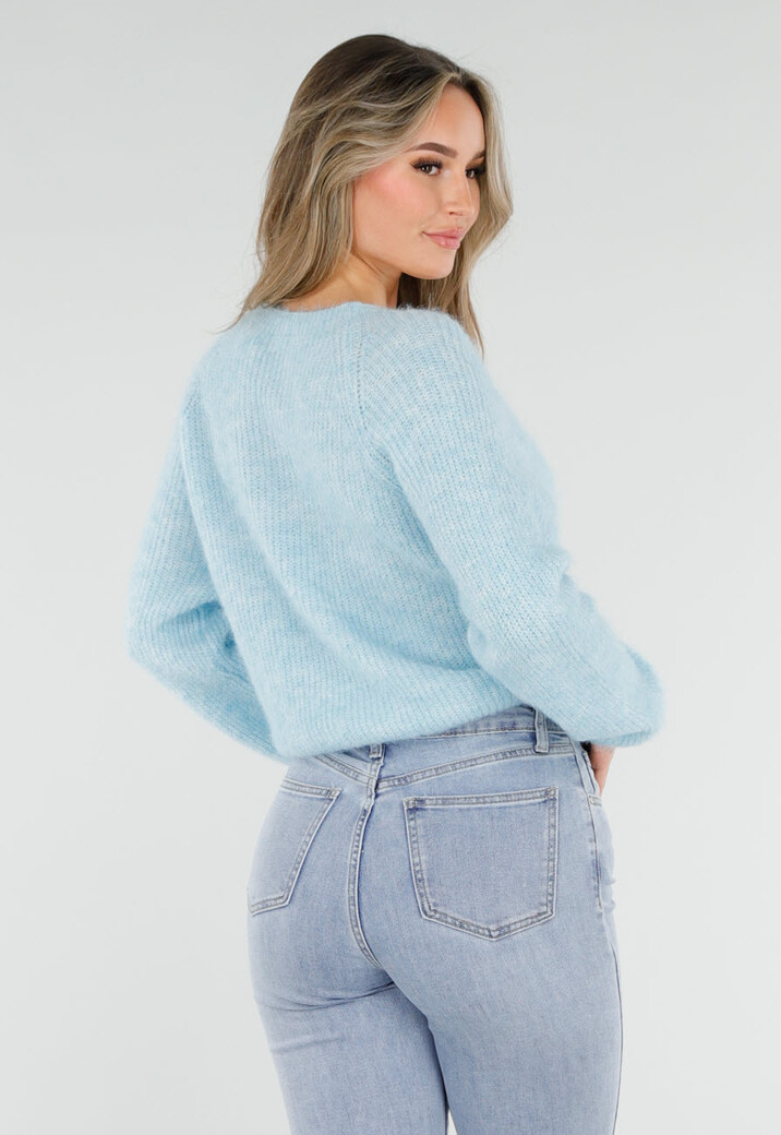 Lichtblauwe Gebreide Trui met Twist en V-Hals
