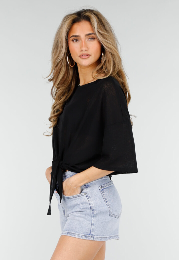 Zwarte Top met Knoopdetail en Korte Mouwen