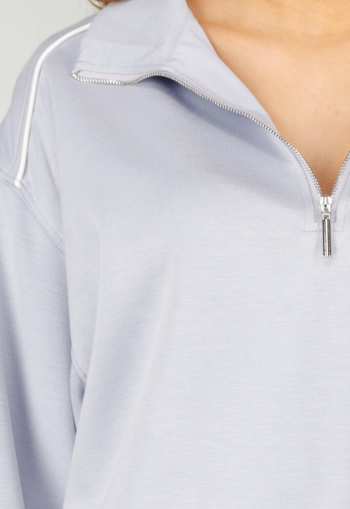 Lichtblauwe Sweater met Halve Rits en Elastische Boorden