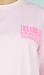 Roze Oversized T-shirt met Tekstprint en Korte Mouwen
